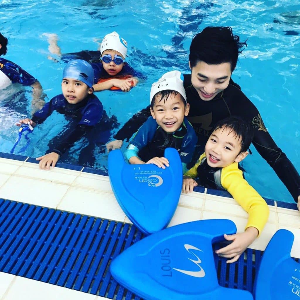 children-learning-swimming-smiling.jpg